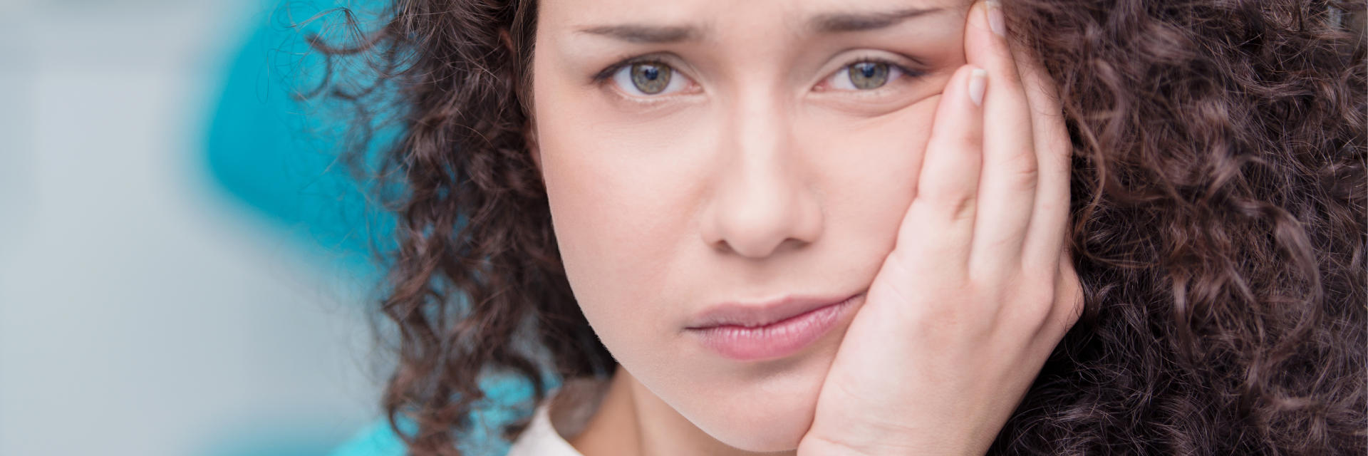 Teenage girl with dental pain.