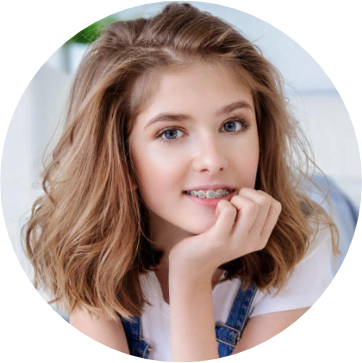 A teenage girl wearing orthodontic braces.