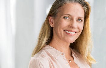 delicate mature woman smiling